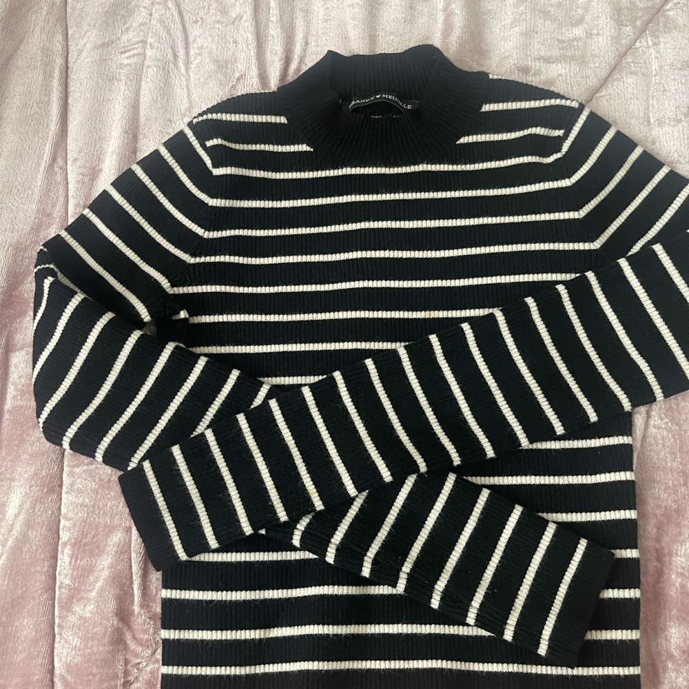 Cute cropped sweater black and white stripes. Small to medium.